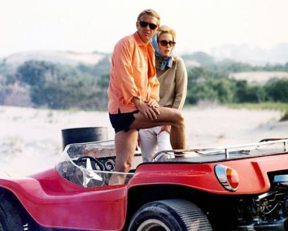 Steve McQueen (1930-1980), US actor, and Faye Dunaway, US actress, posing in an open-top car in a publicity image issued for the film, 'The Thomas Crown Affair', USA, 1968. The crime drama, directed by Norman Jewison, starred McQueen as 'Thomas Crown' and Dunaway as 'Vicki Anderson'. (Photo by Silver Screen Collection/Getty Images)